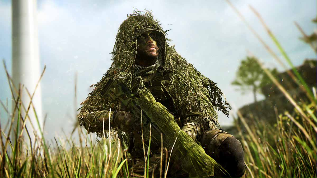 An operator of Call of Duty Modern Warfare 2 or Warzone 2 in some grass. They are a Sniper and wearing a suit that also looks like grass.