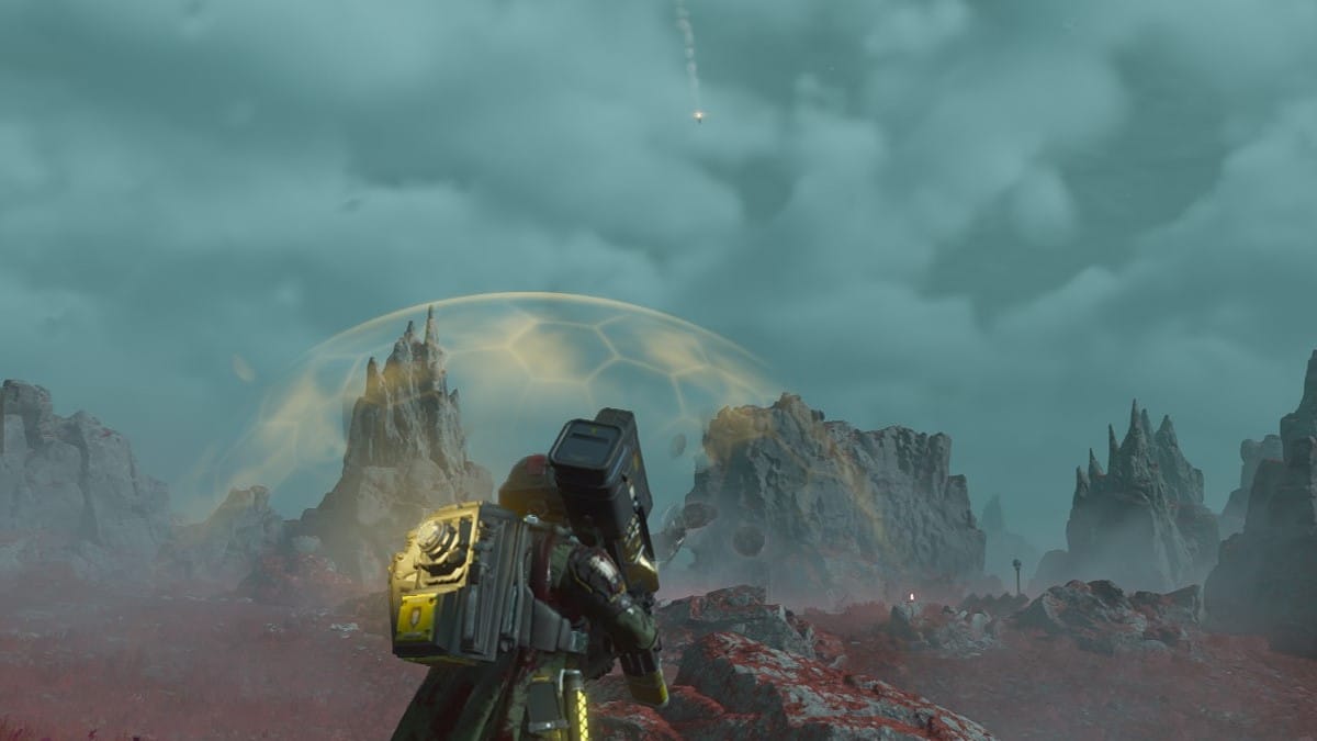 Helldivers 2 screenshot of a Helldiver looking at a falling missile