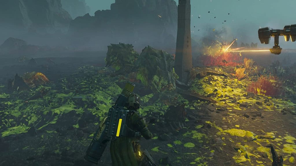 Helldivers 2 image of a player in front of dead Terminids