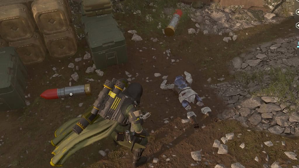 Helldivers 2 screenshot of a player looking at a SEAF corpse and some missles