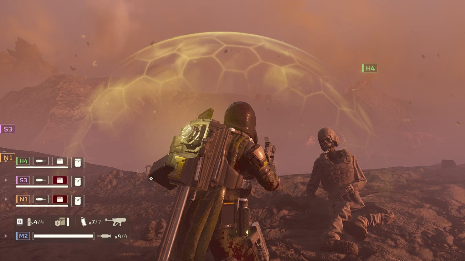 Helldivers 2 player with a pummeler next to a corpse