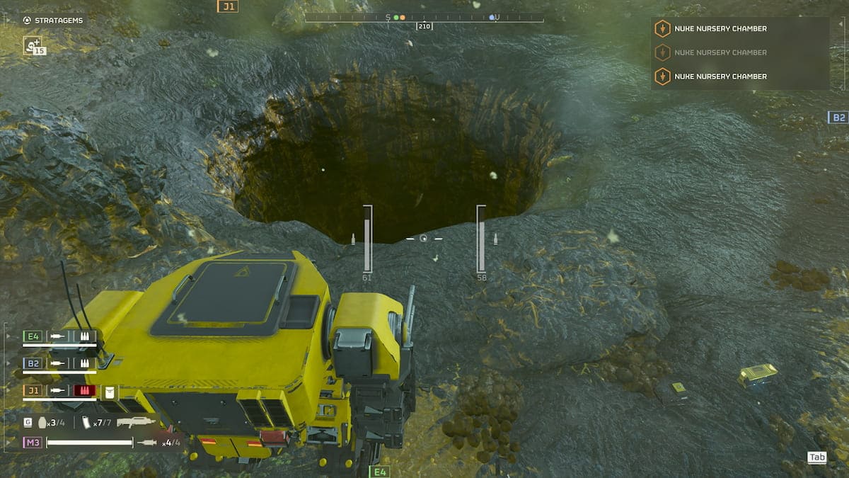 Helldivers 2 emancipator in front of a huge hole