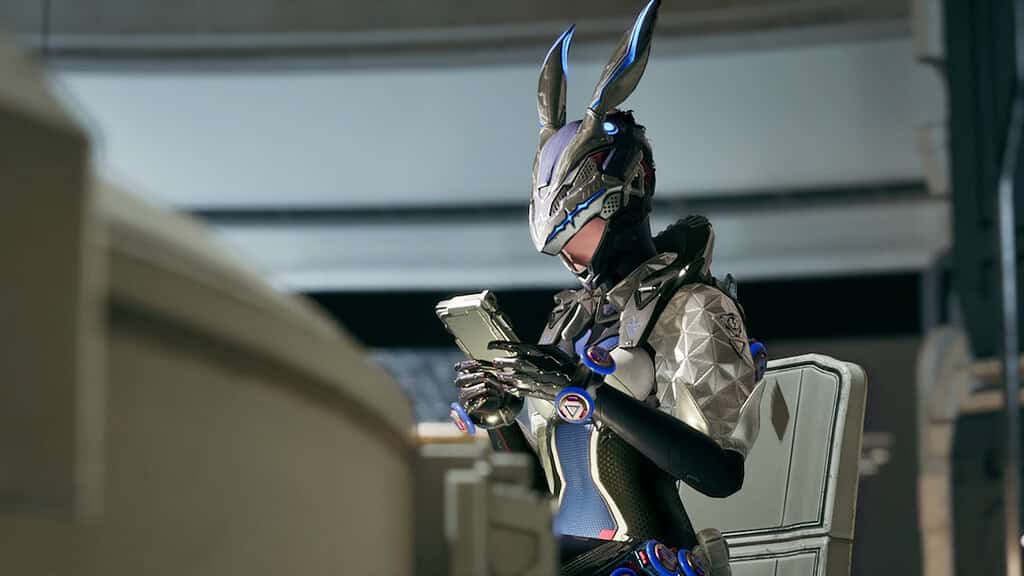 The First Descendant Bunny sitting and holding a tablet