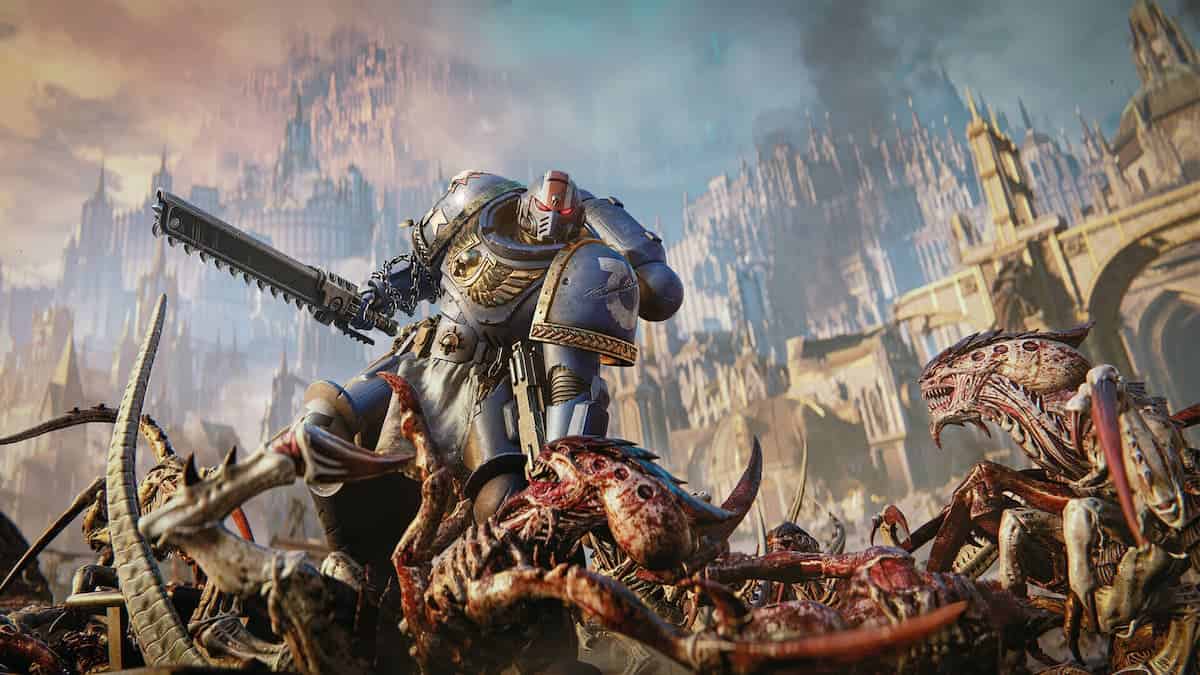 Image of a Space Marine Ultramarine wielding a chainsword on top of a horde of Tyranids from Space Marine 2.