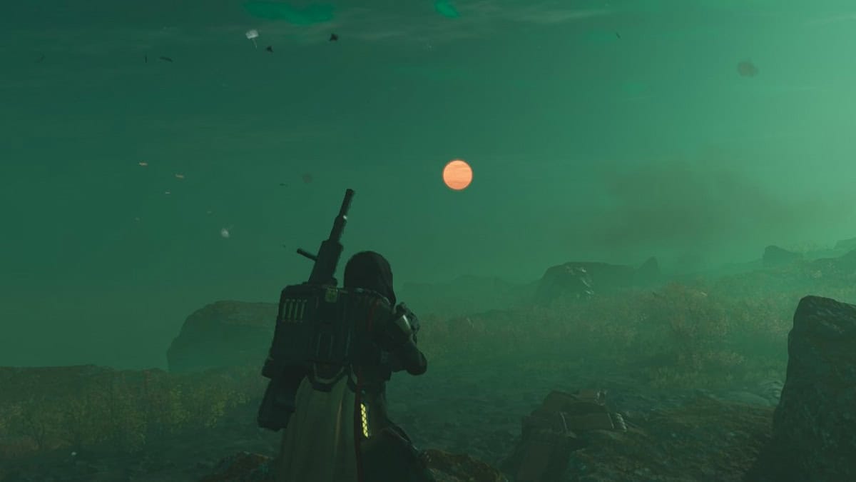 A Helldivers 2 player longingly looking at the moon on the green-ish sky.